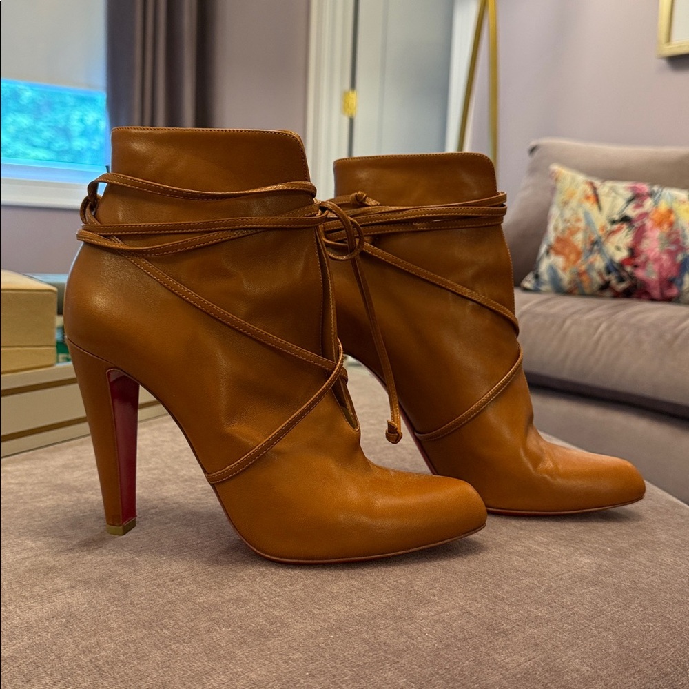 Christian Louboutin Leather Boots
Brown
Semi-pointy toe
4” heel 
Lightly worn